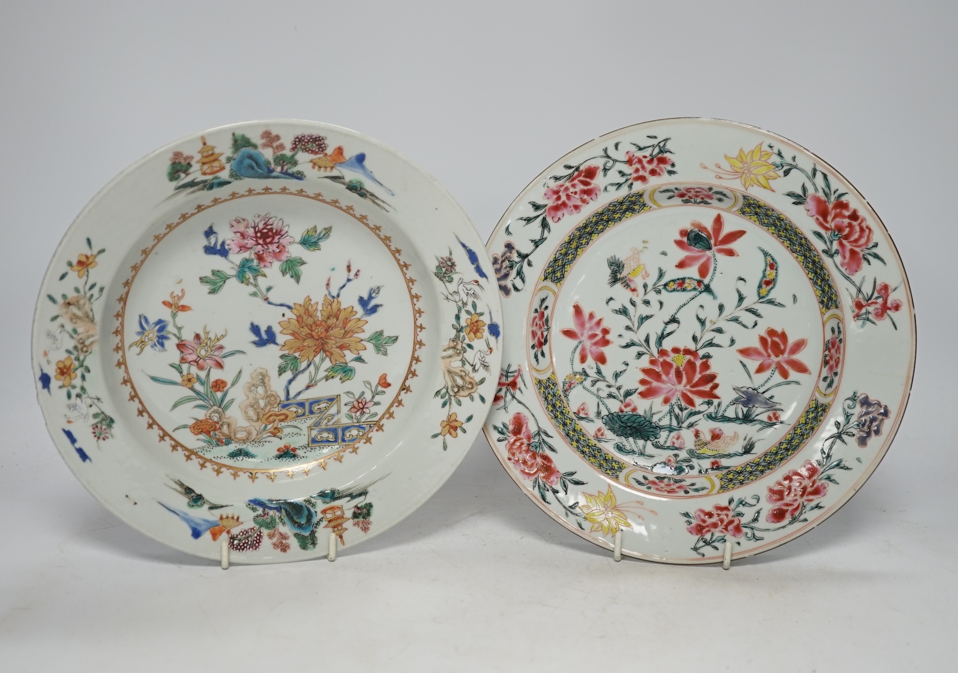 Two Chinese famille rose porcelain plates, mid 18th century, largest 23cm diameter